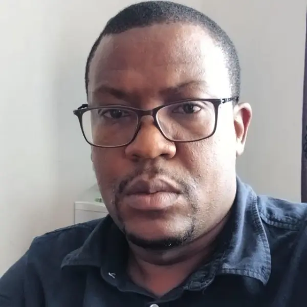 Dr Andrew Magaki
